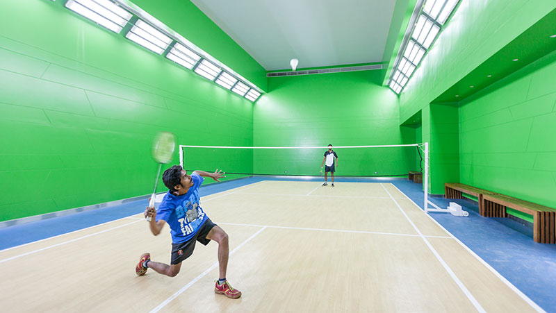 An image of badminton court at Club Aquaria