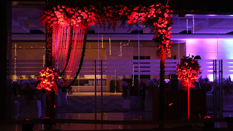 A visiual that displays the warm enterance of the banquet hall at Club Aqauria, Borivali West